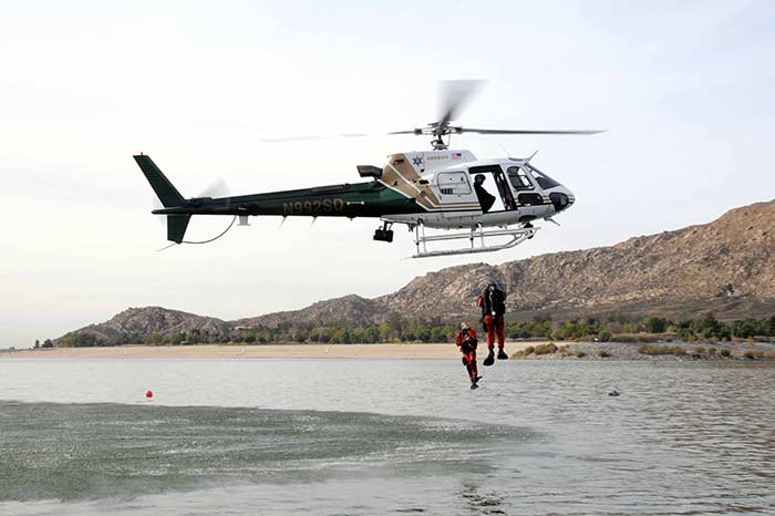 PS Divers deploy from helicopter