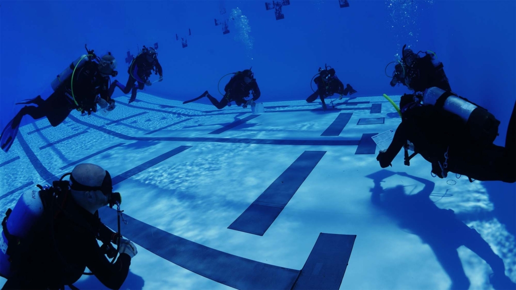 Group of divers in a pool
