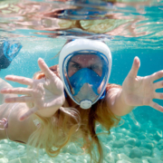 woman with full-face snorkel mask