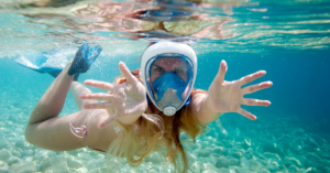 woman with full-face snorkel mask