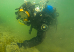 Public safety diver searching underwater
